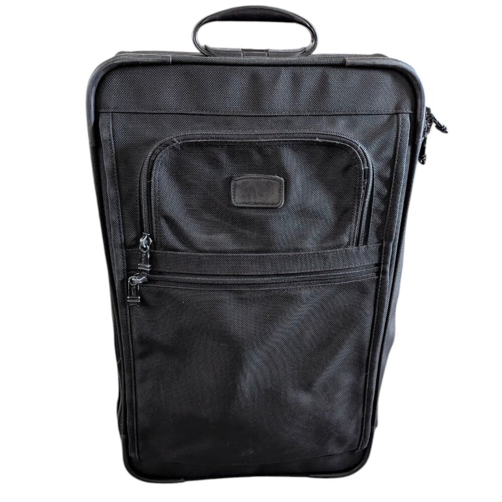 Tumi 23" expandable roller - carry on - retractable pull handle